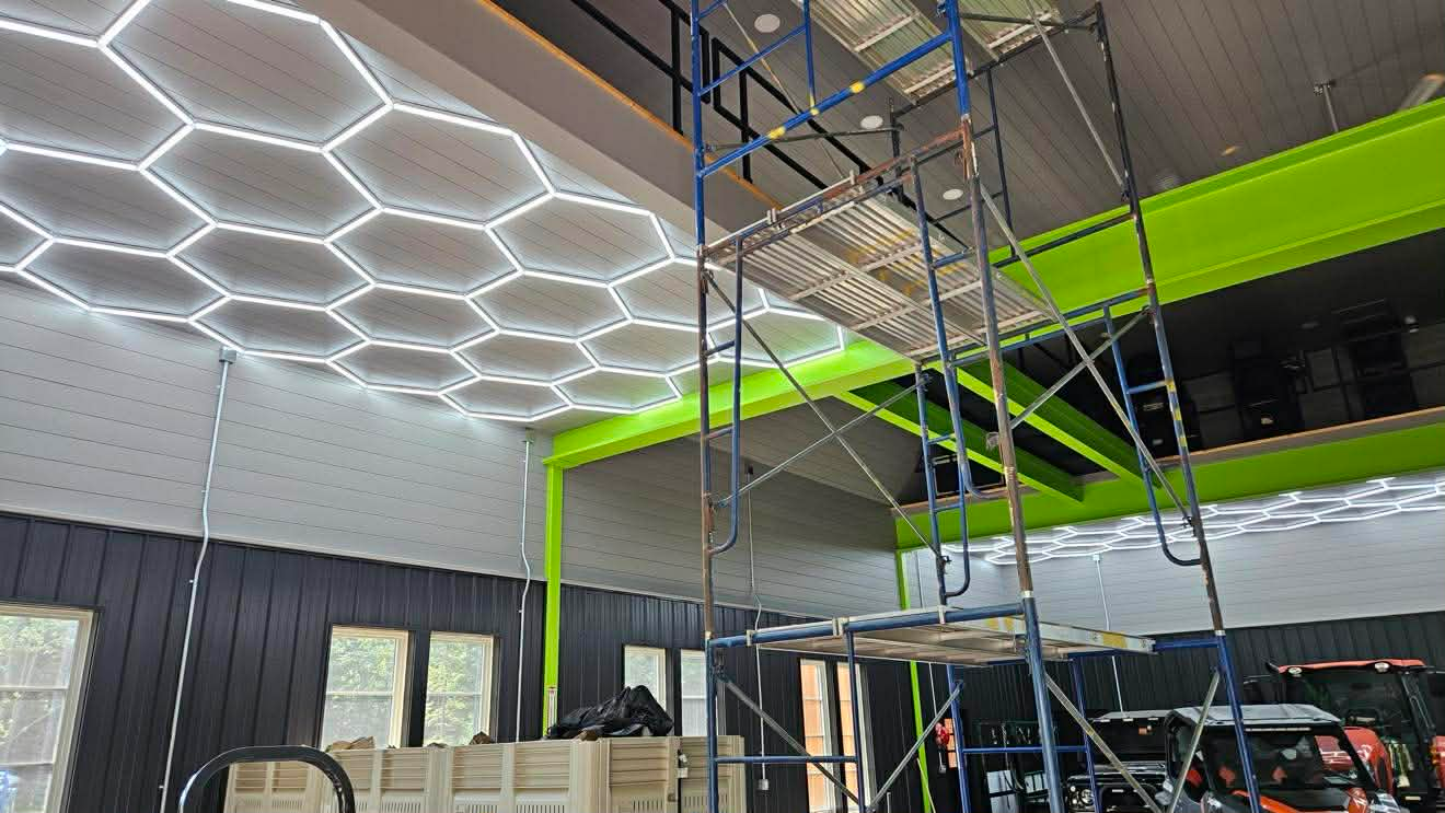 Commercial interior in progress — green trim accents